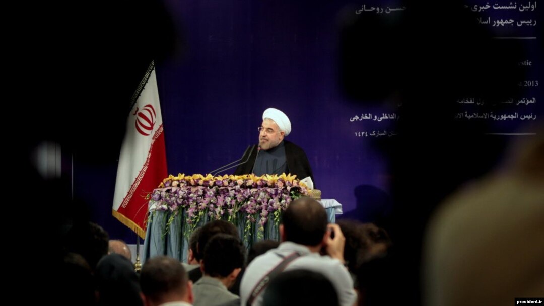 Iran's Hassan Rohani at his first press conference as president on August 6
