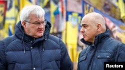 Генеральний секретар Ради Європи Ален Берсе та міністр закордонних справ України Андрій Сибіга під час вшанування пам'яті загиблих українських захисників. Київ, Україна, 16 лютого 2026 року.