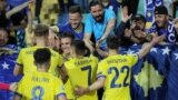 Soccer Football - Euro 2020 Qualifier - Group A - Bulgaria v Kosovo - Vasil Levski National Stadium, Sofia, Bulgaria - June 10, 2019 Kosovo players celebrate with fans after their second goal REUTERS/Stoyan Nenov