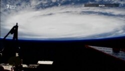 Тӯфони фалокатборро аз кайҳон бубинед