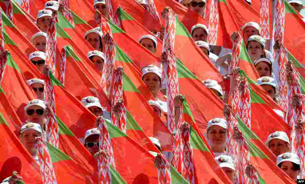 Belarusian teenagers take part in a rehearsal for the upcoming Independence Day parade in Minsk. (AFP/Viktor Drachev)