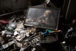 A corner of the wrecked Donbas building where hundreds of rolls of photographs were abandoned after war broke out in 2014.