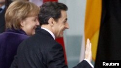 Angela Merkel və Nikola Sarkozi