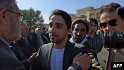 Ahmad Masud (C), the son of Ahmad Shah Massoud, the largely revered late military and political Afghan leader also known as "The Lion of Panjshir" greets supporters during an event marking the fifteen anniversary of his late father's death.