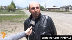 Armenia - Koryun Sumbulian, the newly elected mayor of Bavra village, speaks to RFE/RL, 9Jun2014.