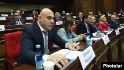 Armenian - Eduard Babayan (L) attends a parliament session in Yerevan, January 15, 2019.