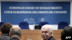 France -- Turkish politician Dogu Perincek from the left-wing Turkish Workers' Party looks on at the European Court of Human Rights in Strasbourg, October 15, 2015