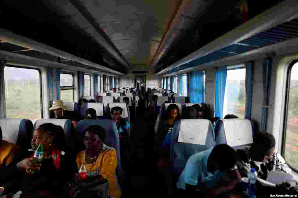 Commuters ride on an SGR passenger train travelling from Mombasa to Nairobi in Nairobi, Kenya, October 24, 2019.