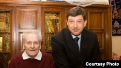 Eighty-eight-year-old Vasily Kononov (left) with his lawyer, Mikhail Loffe
