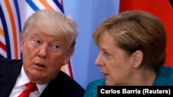 U.S. President Donald Trump and German Chancellor Angela Merkel at a G20 summit last year. 