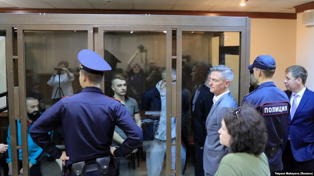 Sailors of Ukrainian naval ships, which were seized by Russia in November 2018, attend a court hearing in Moscow earlier this month. 