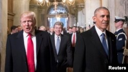 آقایان اوباما و ترامپ در این تصویر از ۲۰ ژانویه در حال رفتن به محل مراسم سوگند ۴۵مین رئیس‌جمهوری آمریکا هستند