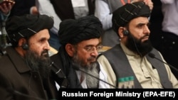 Mullah Baradar (left), the Taliban's deputy leader and chief negotiator, at an international peace conference in Moscow on March 18