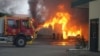 In an image shared by the State Emergency Service of Ukraine, firefighters tackle the blaze following a Russian drone strike in the Volyn region on October 18.