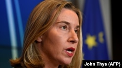 EU foreign-policy chief Federica Mogherini said she would visit Washington early next month to urge U.S. lawmakers not to pull out of the Iran deal.