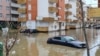 Cars were nearly submerged in the Kosovar town of Fushe, near Pristina. 