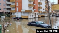 Cars were nearly submerged in the Kosovar town of Fushe, near Pristina. 