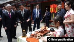 China - Armenian President Serzh Sarkisian visits a school in Beijing, 25Mar2015.