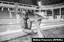 Ismail gives his trainer a high-five