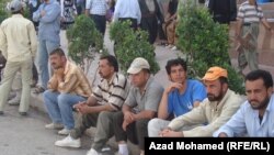 A group of unemployed men in Sulaymaniyah, Iraq, in June 2011