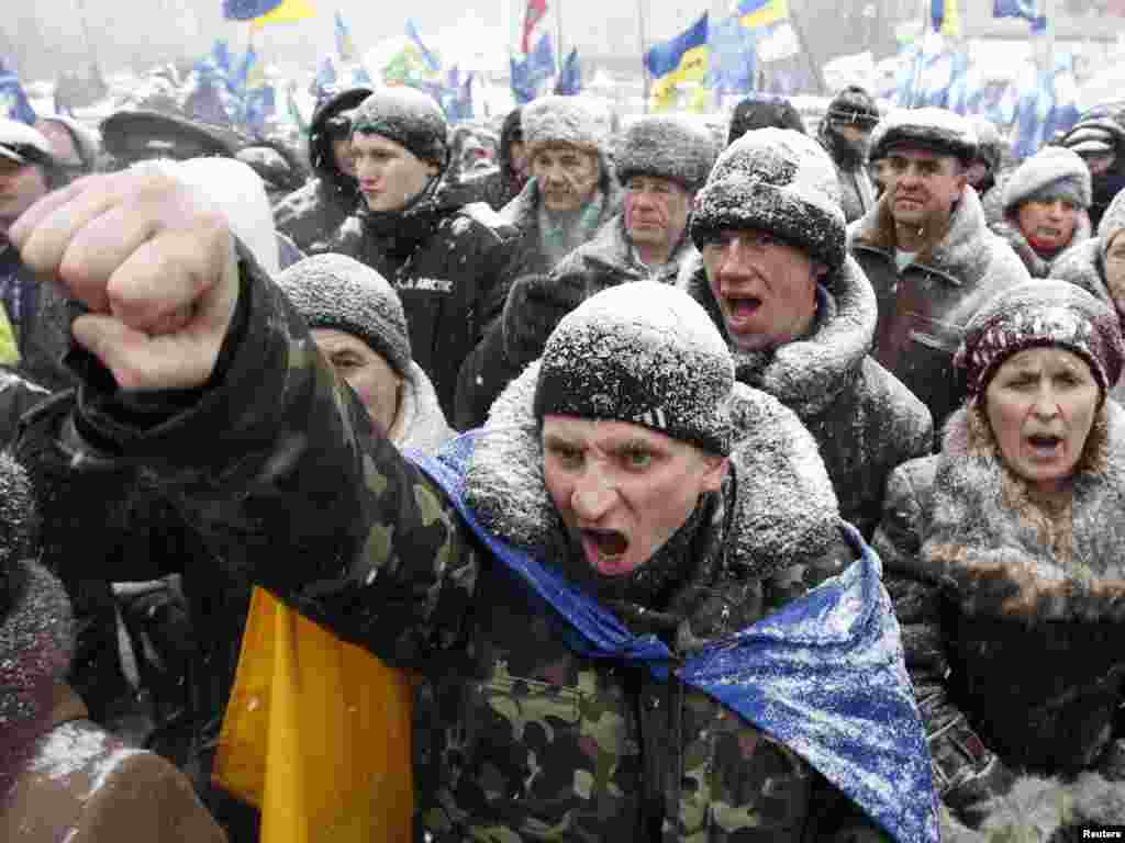 Demonstrators hold a rally to protest against a proposed new Tax Code in central Kyiv on December 2. Political tension is rising over the fate of the proposed new tax-reform plan that has brought thousands of small business owners out on to the streets in protest. Photo by Gleb Garanich for Reuters