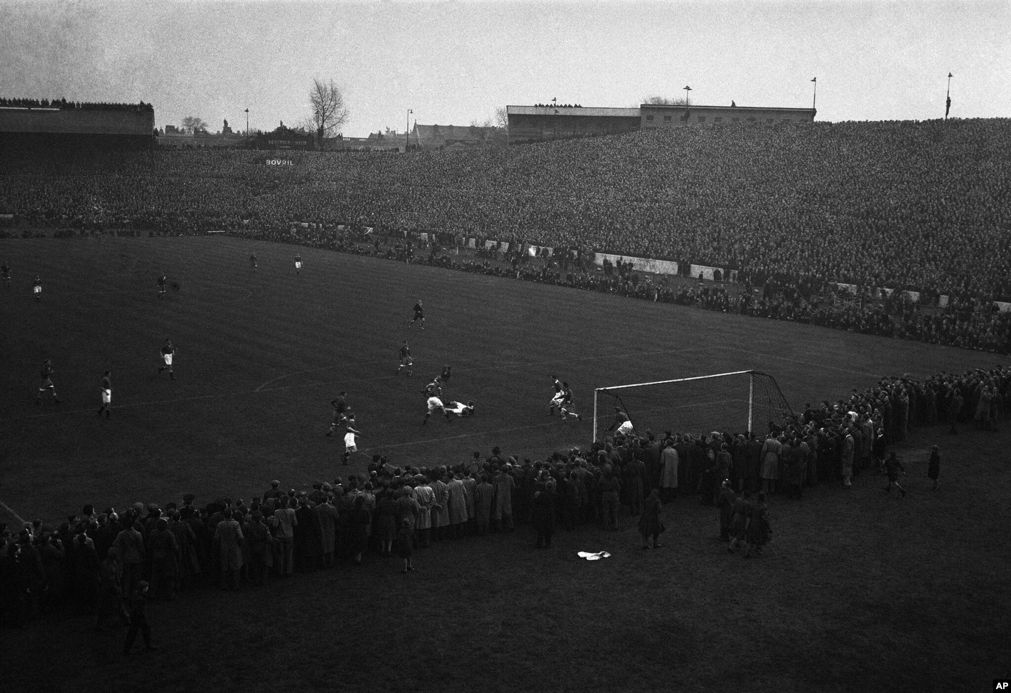 Dynamo Moscow players (in dark) attack the Chelsea goal during the match at Stamford Bridge, London, on November 13, 1945.