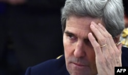 U.S. Secretary of State John Kerry attends a meeting with Russian Foreign Minister Sergei Lavrov in Moscow on December 15.