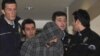 Полиция сопровождает человека, пытавшегося угнать турецкий самолет