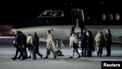 Representatives of the Taliban arrive for talks in Gardermoen, Norway, on January 22