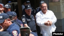 Armenia - Businessman and opposition leader Gagik Tsarukian is brought to an Investigative Committee building in Yerevan for further questioning, July 22, 2026.