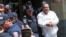 Armenia - Businessman and opposition leader Gagik Tsarukian is brought to an Investigative Committee building in Yerevan for further questioning, July 22, 2026.