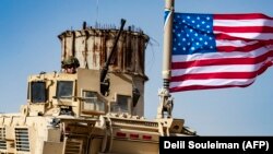 Militar american la o bacă a coaliției internaționale condusă de statele Unite în Siria, Ras al-Ain, Siria, 6 octombrie 2019