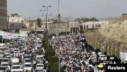  Anti-government protesters attend a rally in Sanaa on September 23. 