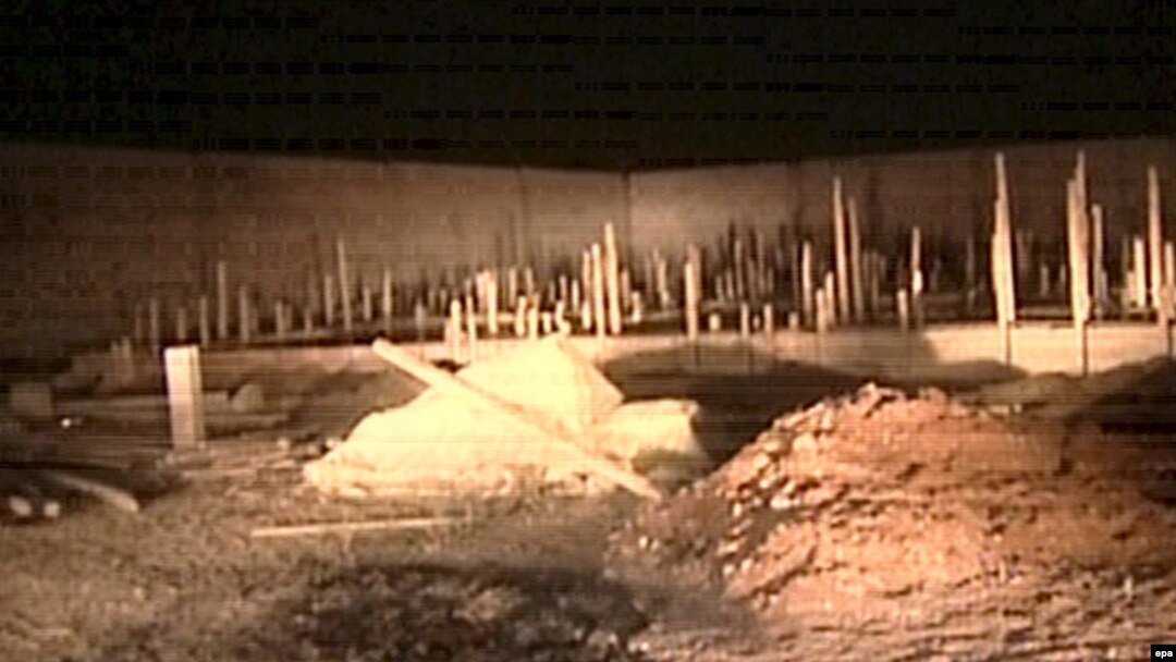 A video grab from Syrian TV shows rubble following an attack on a border village on October 26.
