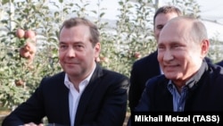 Дмитрий Медведев и Владимир Путин. 9 октября 2018. Фото ТАСС