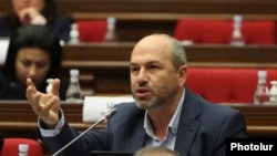 Armenia - Parliament deputy Gegham Nazarian speaks during a session of the National Assembly.