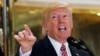 U.S. President Donald Trump answers questions about his response to the rally in Charlottesville as he talks to the media in the lobby of Trump Tower in Manhattan, New York, on August 15.