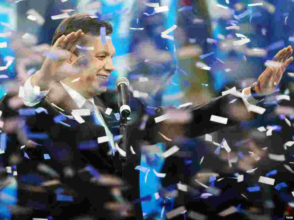 Waving to supporters at a congress of his Party of Regions in Kyiv.