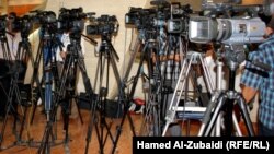 Iraq - Photo-journalists at work, Mosul, undated