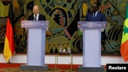 Senegal's President Macky Sall (right) and German Chancellor Olaf Scholz hold a press conference at the presidential palace in Dakar on May 22.