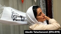 IRAN -- Former imprisoned Iranian lawyer and human rights activist Nasrin Sotoudeh adjusts her scarf at her house in Tehran, September 18, 2013