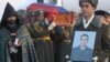 Armenia - The funeral of Lieutenant Gurgen Markarian, an Armenian army officer who was axe-murdered by an Azerbaijani colleague during a NATO training course in Budapest, 25Feb2004.