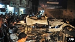 The scene of a bomb explosion in Peshawar that killed journalist Nasrullah Afridi in May 2011.