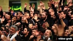 A religious gathering in Iran to hear the sermon of a maddah or eulogist, or Shi'ite preacher. Observers say Iran's supreme leader, Ayatollah Ali Khamenei, has mobilized maddahs as a powerful political tool to keep his base among believers. File photo