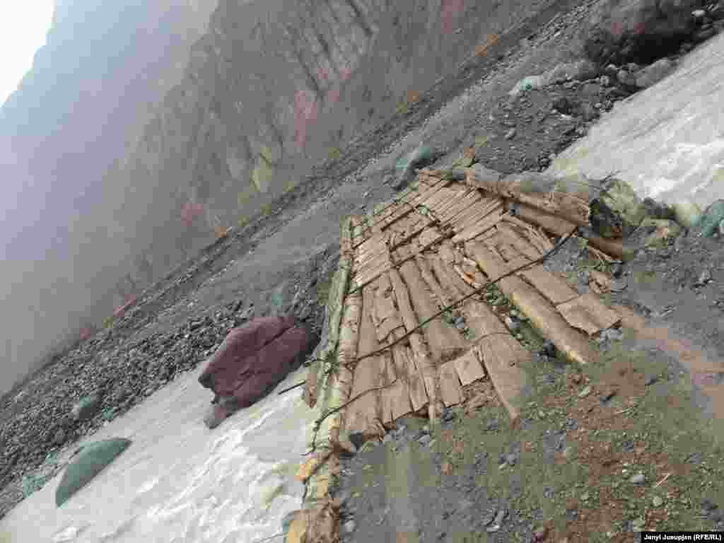A bridge on the Mök River, which starts from the glaciers of what the locals call Muz-Too or "Ice Mountain." The bridge is built every autumn from money the villagers collect between themselves. In spring, they remove the bridge, or it is taken away by strong currents, as happened last April.
