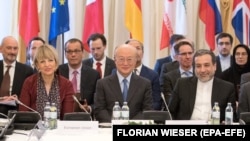 Members of the Joint Comprehensive Plan of Action (JCPOA) Joint Commission, EU-director Helga Schmid (L), Yukiya Amano Director General of the International Atomic Energy Agency (IAEA) (C) and Iranian Deputy-Foreign Ministers Abbas Araghchi (R). File photo