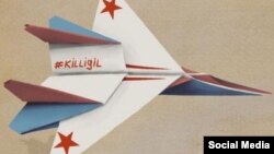 Flash-mob participants are instructed to craft paper planes and write inspirational messages for the Russian military pilots. They should then upload photos of their handiwork to social media using the hashtag.