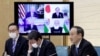 Premierul Japoniei, Yoshihide Suga în timpul reuniunii online cu liderii din Statele Unite, Australia și India: președintele american Joe Biden, premierul australian Scott Morrison și premierul indian, Narendra Modi.