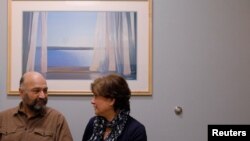 مازیار هاشمی در کنار همسرش،‌ فرشته