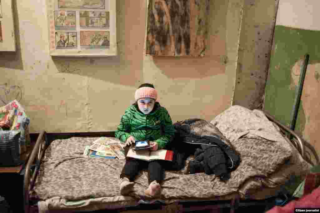 Donetsk, Ukrain. A bomb shelter in Petrovsky district. Albina Ryabenko, was slightly injured with shelling.